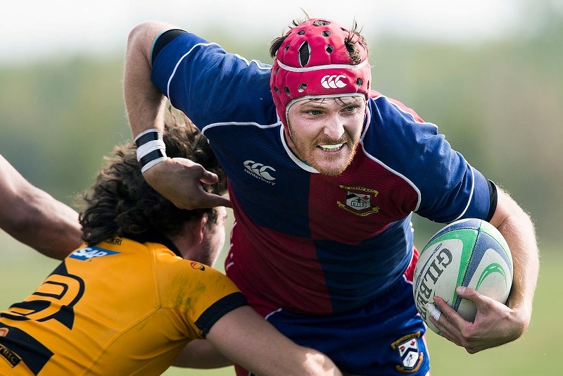 DETERMINATION &#8211; Byron Elliott pushes forward for the St. Albert premier men against the Calgary Hornets in Saturday&#8217;s 28-27 squeaker at the St. Albert Rugby