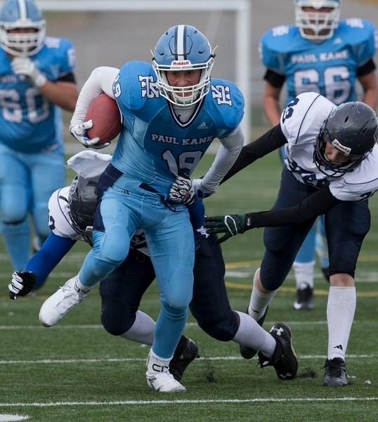 PULLING AWAY &#8211; Aidan Mueller of the Paul Kane Blues breaks away from the Ross Sheppard Thunderbirds in the Carr division one contest Thursday at Riel Recreation Park.