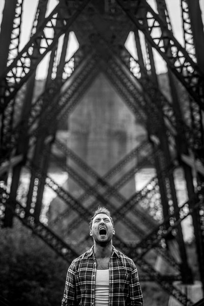 Jamie (Neil Kuefler) screams out his pain in the Theatre Yes production of Bone Cage now playing at L&#8217;UniThéatre at Cité Francophone.