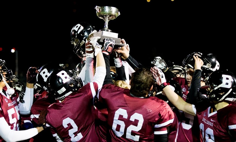 CUP CELEBRATION – The Bellerose Bulldogs hoist the championship cup after winning the metro Edmonton division one junior final Thursday. The Bulldogs levelled the Bev Facey