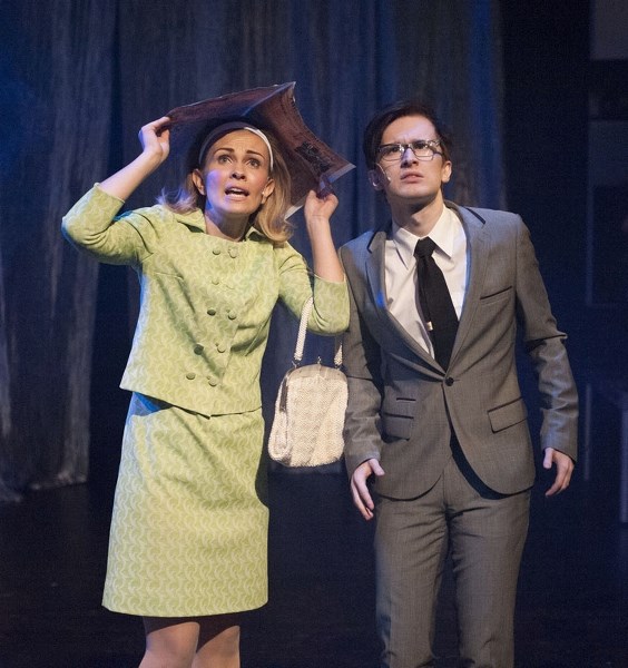 St. Albert actress Nadine Veroba as Janet stands in the rain alongside Brad (Dustyn Tennessen) during Two-One Way Tickets to Broadway production of Rocky Horror Show now on
