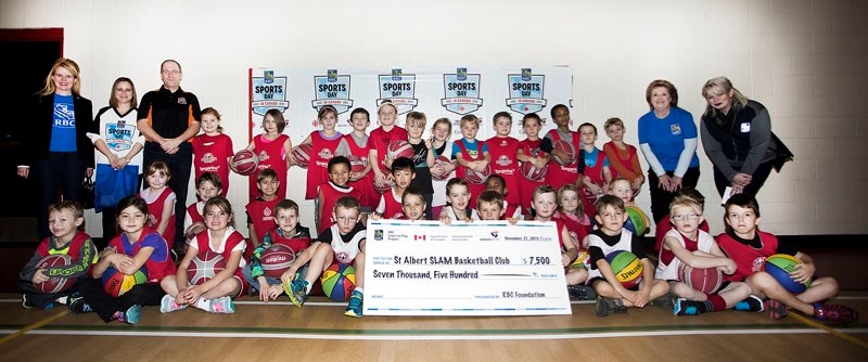 RBC CHEQUES IN FOR SLAM – The stars of tomorrow in St. Albert basketball were on hand at Ronald Harvey School for Saturday&#8217;s cheque presentation of $7
