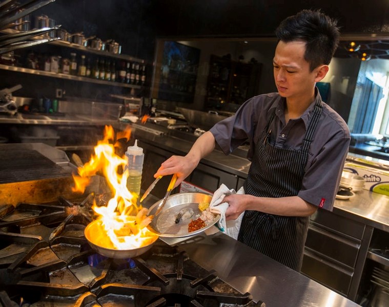 XIX Nineteen chef Rino Lam prepares some specialized food that many football fans who are looking for non-traditional game-time delights might enjoy.