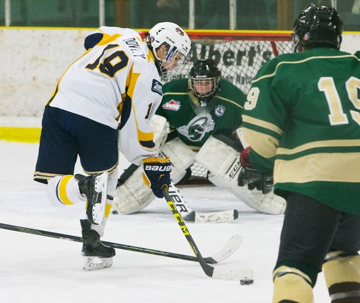 SCORING CHANCE – Stuart Dovey of the St. Albert Sabres attacks the net against goalie Braden Hapgood of the PAC Saints in Monday&#8217;s bantam AAA game at Akinsdale Arena.