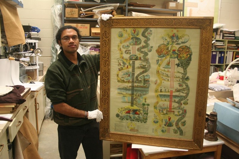 NEW BY COMPARISON – Archivist Vino Vipulanantharajah shows off the oldest artifact at the Musée Heritage Museum in St. Albert