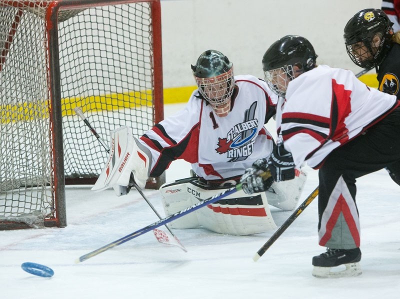 NET PROTECTOR – Sydney Ford of the St. Albert Mission U16AA juniors guards the net against the Central Alberta Sting in tournament action last month in Edmonton. Last weekend 