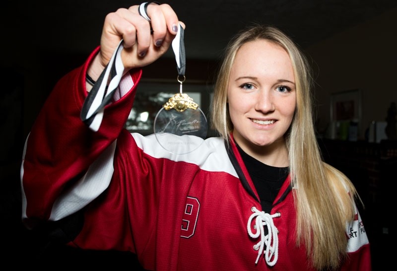 MEDAL OF HONOUR â€“ Lauren Henderson of St. Albert displays her gold medal with the Team Canada U21 juniors at the world ringette championship in Helsinki