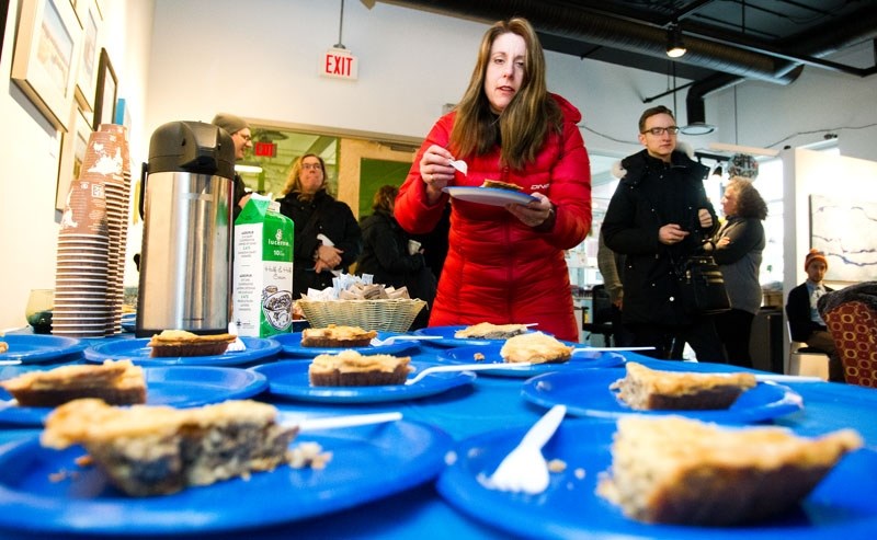 Maureen Wade prepares tourtiĂ¨res.