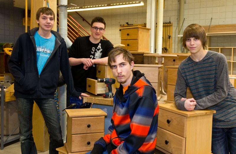 GENEROSITY â€” Construction students at Bellerose High School (L-R) Graeme Wolf