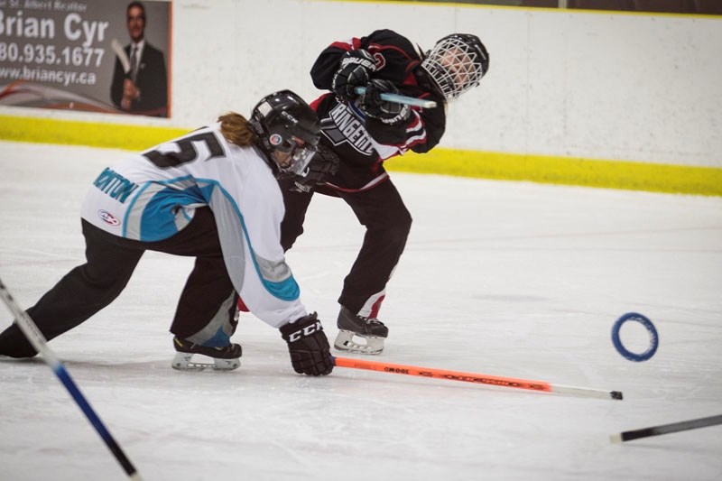 SHOOTER &#8211; Morgan Laporte of the St. Albert Mission fires the ring against the Edmonton Elite in U14AA tween action. Last weekend the Mission finished 1-3 at the 30th