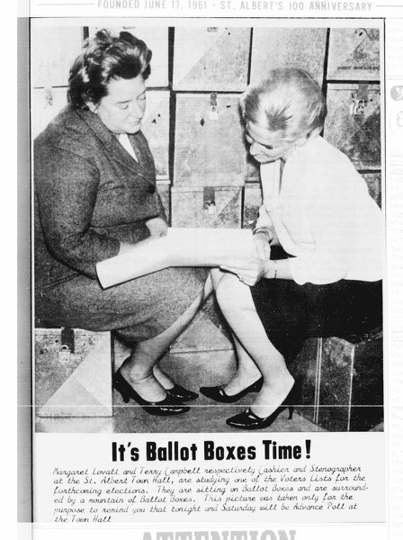 A pair of women consult the voter&#8217;s list as part of election prepartions in St. Albert in the early 1960s.