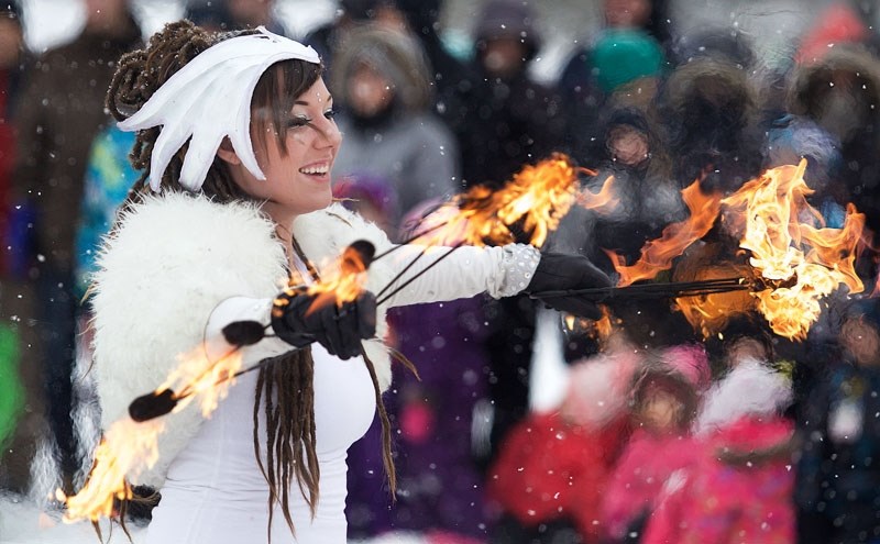 Marissa Puff of Fable Entertainment putting on a show for the crowd at the Fire and Ice Festivities at Lacombe Lake Park.