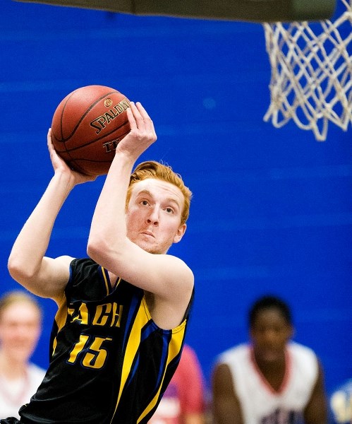 LOOKING TO SCORE &#8211; James MacPhail of the St. Albert Skyhawks attacks the basket in Saturday&#8217;s 86-74 semifinal loss to the Strathcona Christian Academy Eagles at