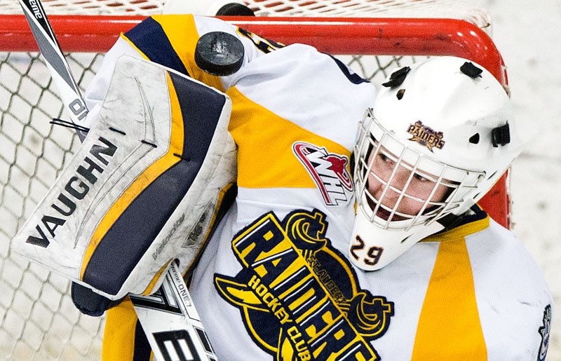 PUCK STOPPER &#8211; Evan Fradette of the St. Albert Gregg Distributors Sabres blocks a shot during a 22-save performance in Saturday&#8217;s 3-3 tie against the Lloydminster 