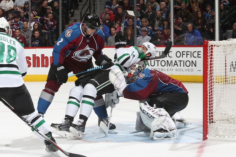 CREASE PROTECTOR &#8211; Nick Holden of St. Albert works over Jamie Benn of the Dallas Stars while defending the net with goalie Semyon Varlamov of the Colorado Avalanche