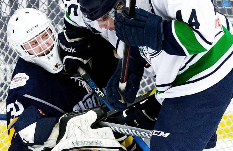 STICKY SITUATION â€“ Ty Clelland has company in the crease