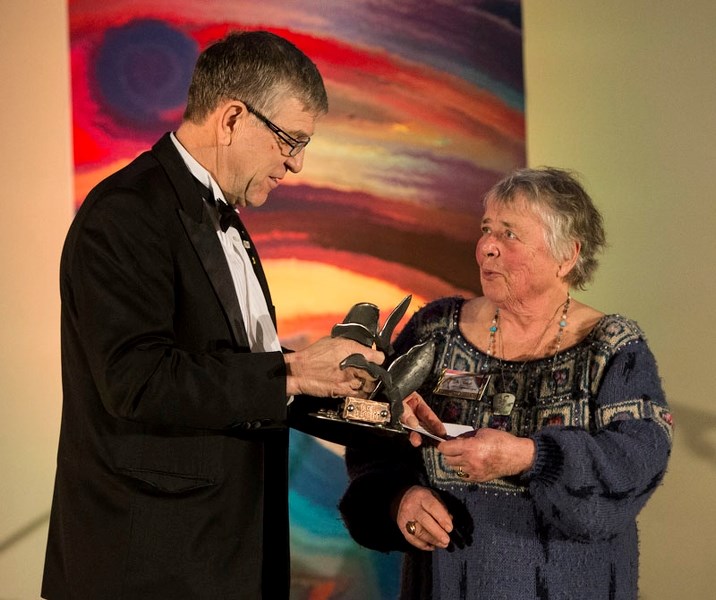 Elke Blodgett receives her lifetime achievement award from Mayor Nolan Crouse.