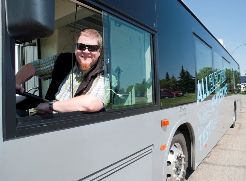 SWEET RIDE â€“ PWTransit Canada service delivery manager Morgan Smith test-drives an electric bus on loan from Edmonton in this 2014 photo. City council decided last week to