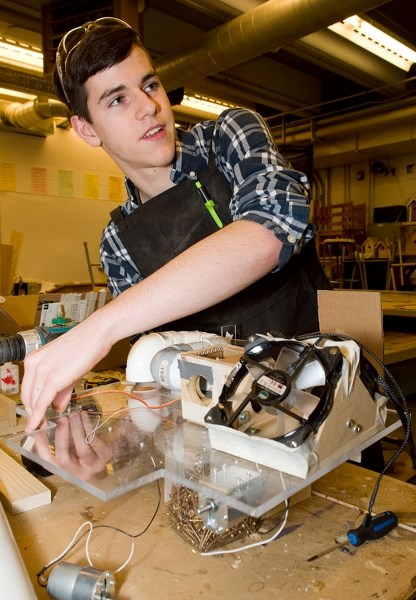 TONY STARK? â€“ Paul Kane student Evan Gamble constructs an allegedly non-killer robot in preparation for this Saturday&#8217;s Science Olympics in Edmonton. The robot is