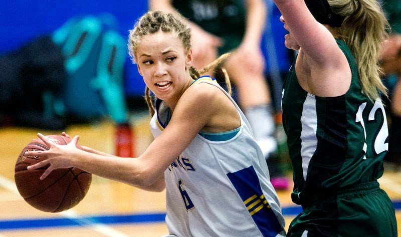 GAME STAR â€“ Aphia Ward of the St. Albert Skyhawks looks for support while pressured by Aiden Kilcommons of the Spruce Grove Panthers in the metro Edmonton division one