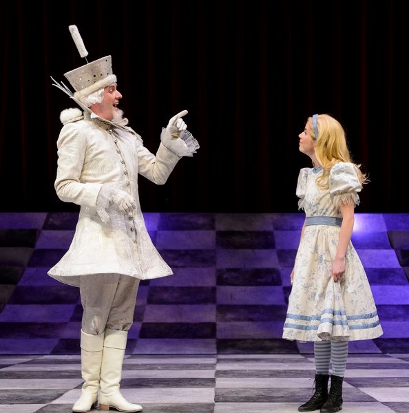 Andrew MacDonald-Smith as the White King lectures Alice (Ellie Heath) about all the king&#8217;s men in the Citadel Theatre production of Alice Through the Looking-Glass now