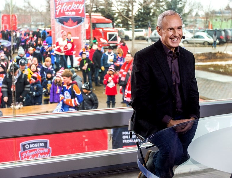 HOCKEY HOST â€“ Ron MacLean of Sportsnet prepares to record a segment for the Rogers Hometown Hockey Tour with St. Anne Street as a backdrop on Sunday afternoon.