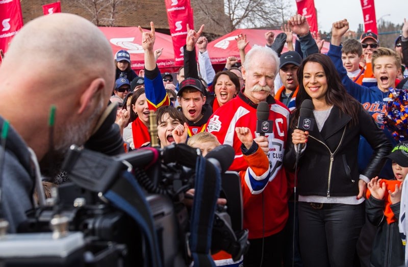 ATTRACTING A CROWD â€“ Hometown Hockey co-host Tara Slone and Hall of Famer Lanny McDonald record a segment for Sportsnet Central and Hockey Night in Canada with fans in the