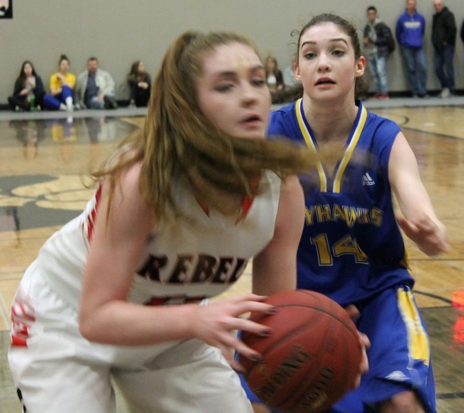 DEFENSIVE COVERAGE â€“ Sarah Dedrick of the St. Albert Skyhawks covers Hailey Weaver of the Jasper Place Rebels in Saturday&#8217;s metro Edmonton division one final at