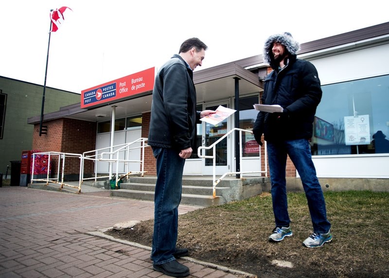 Members of the Canadian Union of Postal Workers held an informational picket on Perron Street Thursday about the proposed post office closure.