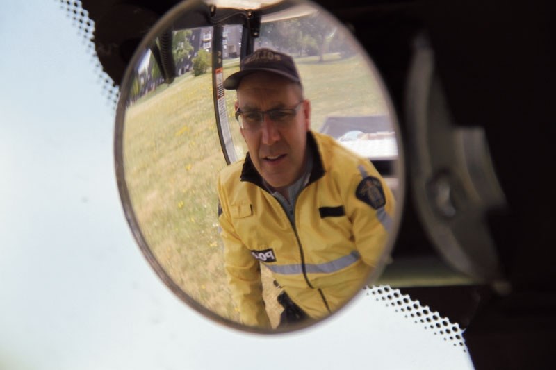 Const. Geoff McKay now drives it through the city in the RCMP&#8217;s electric patrol vehicle last summer.