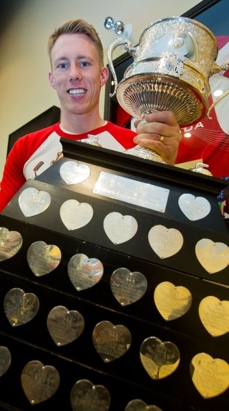 BRIER CHAMPION â€“ Marc Kennedy of St. Albert shows off the Brier Tankard on Saturday afternoon in the Hec Gervais Lounge at the St. Albert Curling Club. Kennedy is a