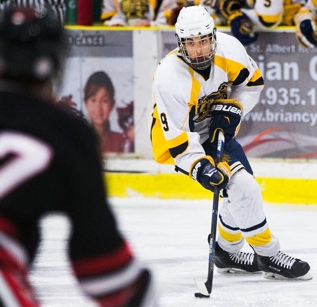BEARING DOWN &#8211; Graziano Grozic of the St. Albert Bears skates with the puck against the Beaumont Braves in game two in the best-of-three Edmonton Rural Bantam AA Hockey 