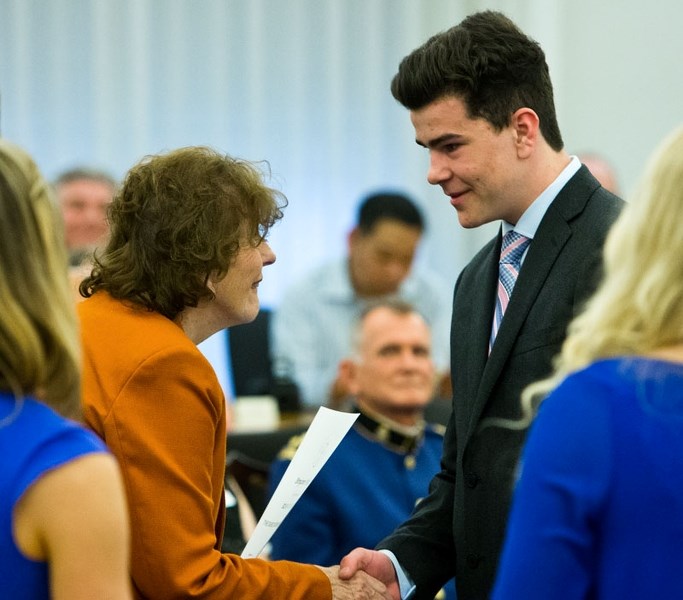 DUKE AWARDED â€” Benjamin Miller of St. Albert was one of 23 youths to recieve the Duke of Edinburgh Silver level award from Lt. Gov Lois Mitchell at Government House on