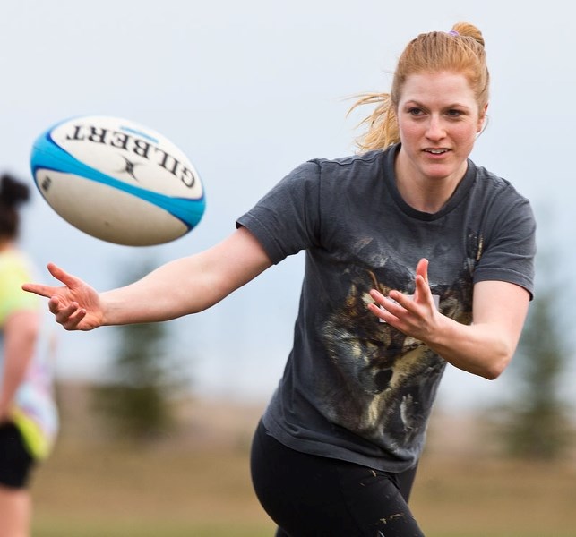 PLAYING CATCH &#8211; Michelle Marler reels in the ball during Monday&#8217;s training session at the St. Albert Rugby Football Club. The SARFC women&#8217;s team is