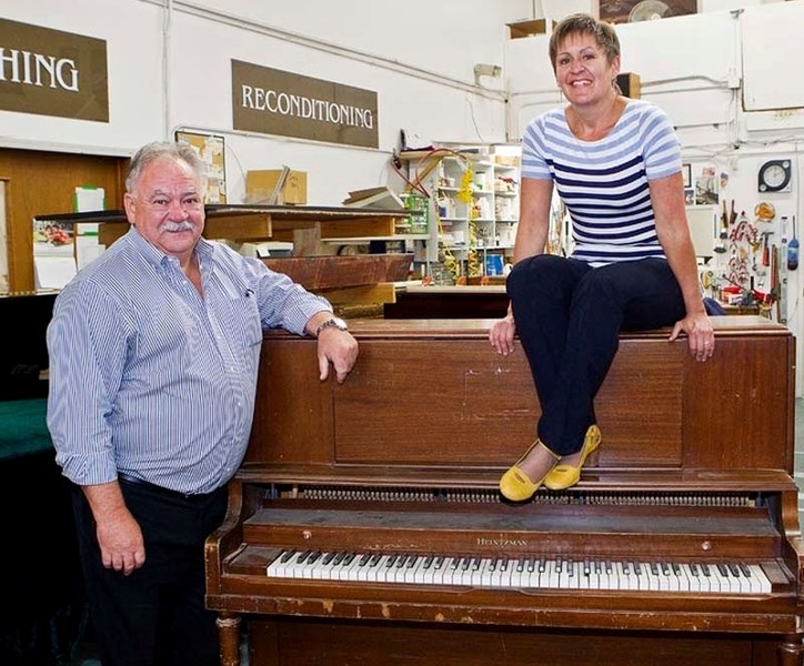 Don Vaugeois and Nancy Watt enjoy a whimsical moment planning new piano-style ventures.