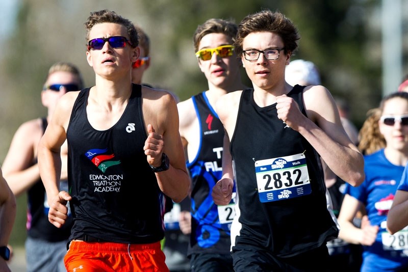 START TO FINISH â€“ Luke Hanson (2832) of St. Albert busts loose from the start line for runners in the 10-km and five-km races at the Landrex St. Albert Road Race on Sunday. 