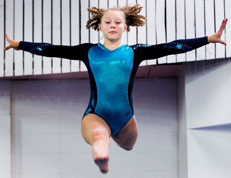 JUMPING FOR JOY â€“ Emily Pilat of the Dynamyx Gymnastics Club will compete at westerns this weekend in Richmond