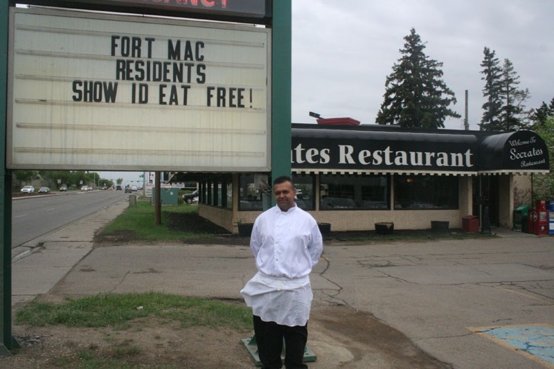 Socrates Restaurant owner Aiyaz Ali was offering free meals to evacuees earlier this week.