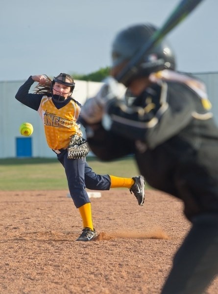 THROWING HEAT â€“ Kiara Charchuk fires a pitch for U12B St. Albert Angels (Edwards) against High Park #1 (Friedrich) Wednesday at the Fountain Park diamonds. Charchuk and