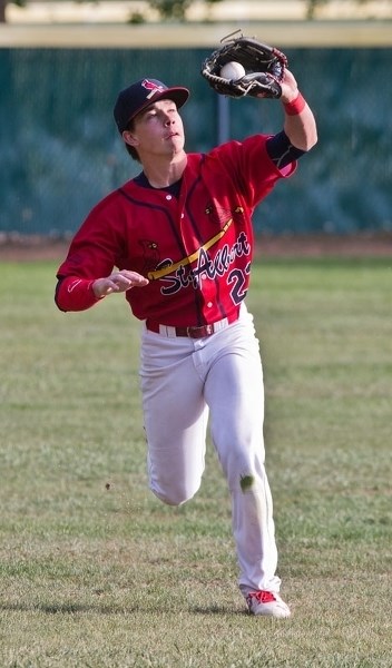 GOTCHA â€“ Damien Obrigewitch makes a catch in the outfield for the St. Albert Cardinals in Wednesday&#8217;s 4-3 win over SEEBA 1 in the Norwest Midget AAA Baseball League