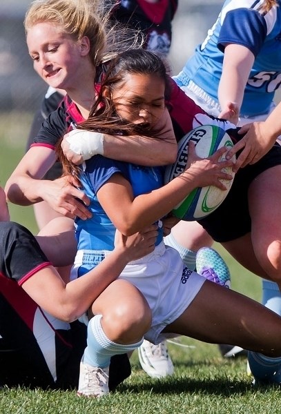 GRIPPING TACKLE â€“ Brittany Siewert of the Bellerose Bulldogs wraps up Victoria Argel of the Paul Kane Blues in Tuesday&#8217;s showdown for the Gareth Jones Cup at the St.