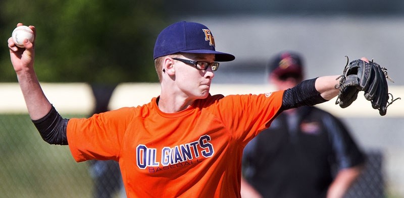 BACK ON THE DIAMOND â€“ Parker Poole of the Fort McMurray Oil Giants delivers a pitch against the St. Albert Cardinals in Sunday&#8217;s bantam AAA game at Legion Memorial