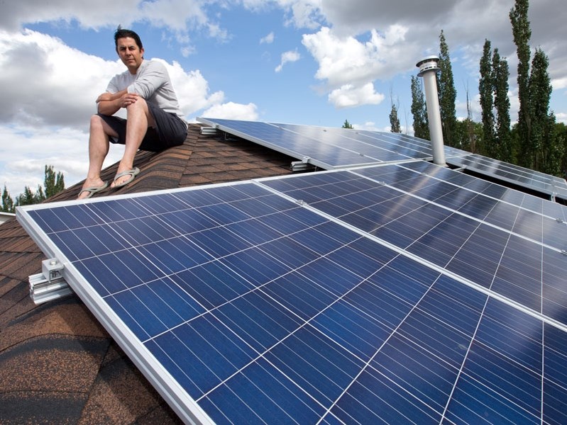 SUNCATCHER â€“ St. Albert&#8217;s Dave Pearson shows off the 8.5 kW solar array on the roof of his Erin Ridge home. The $20