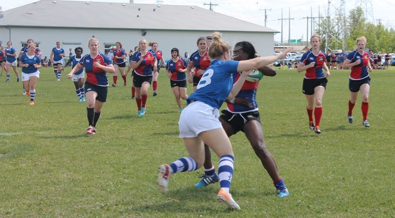 SIDE-STEP â€“ Marcia Davis attempts to slip past a defender