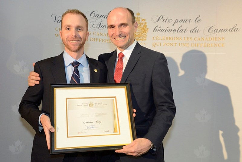 Minister Jean-Yves Duclos presents Ryan Andrews of Landrex with the business leader Canada&#8217;s Volunteer Award for the prairies region at a ceremony in Ottawa