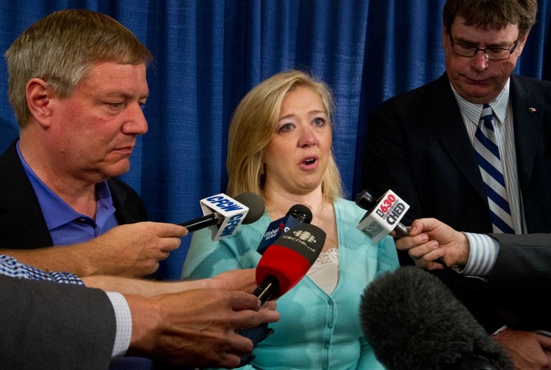 Shelley MacInnis-Wynn speaks at a press conference last June about Brent Rathgeber&#8217;s proposed bill
