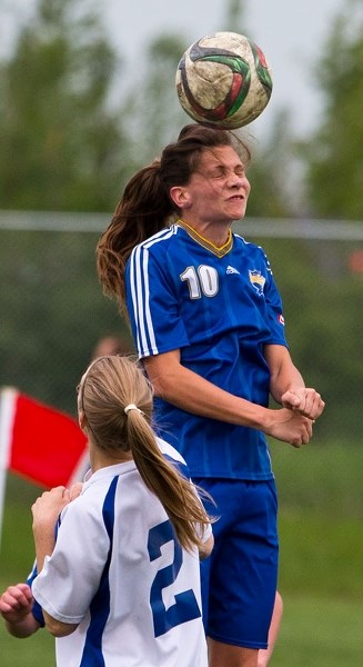ON THE BALL â€“ Jessica Rankine heads the ball for the St. Albert Impact premier women against Dreadnought in the Edmonton District Soccer Association. Rankine scored once in 
