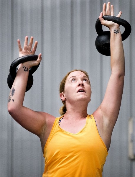 Amanda Layden teaches a kettlebell class at Servus Place.