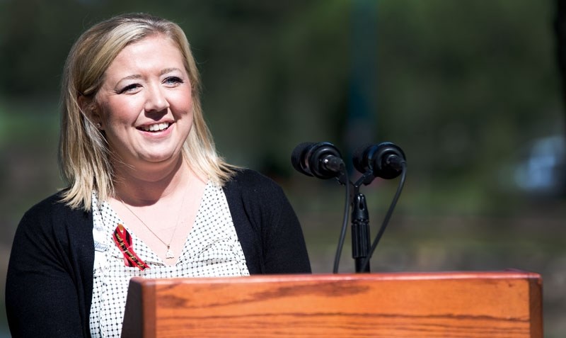 Shelly Wynn speaks with media during the announcement of a memorial in the honor of Constable David Wynn at Lacombe Lake Park on Tuesday June 28