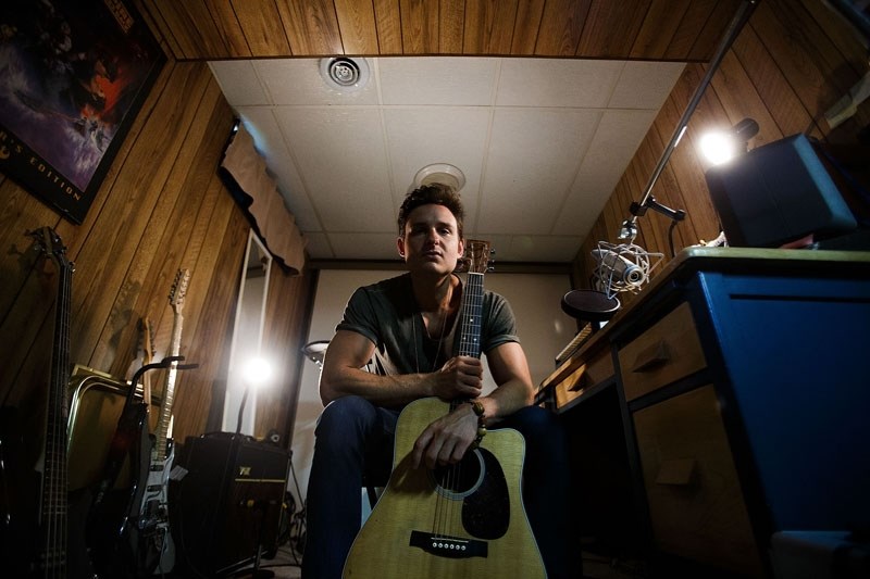Musician Paul Woida is photographed in his home in St. Albert on Wednesday.